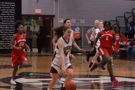 Junior Gianna Rifrogiato going in for a layup on a fast break in their previous win against North Chicago.