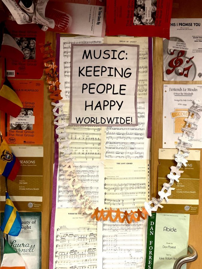 Festive decorations are put up on the choir room doors to happily welcome students in. 