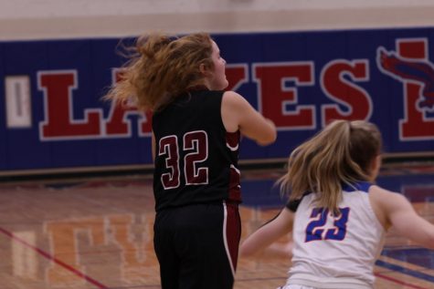 Senior Molly Volkmar looks to pass the ball off to a fellow teammate.