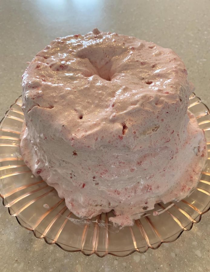 Strawberry frosting gave the cake the best finishing touch.
