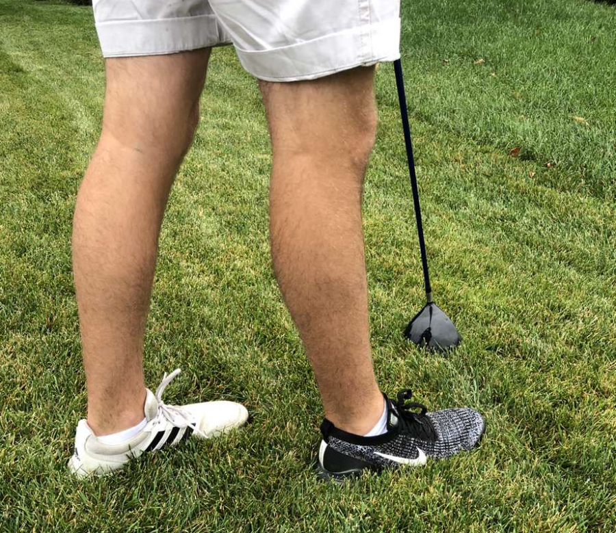 Senior Blake Wilson wearing black and white golf shoes to symbolize the fight against social injustice and racial issues that have plagued the United States since the beginning of colonization