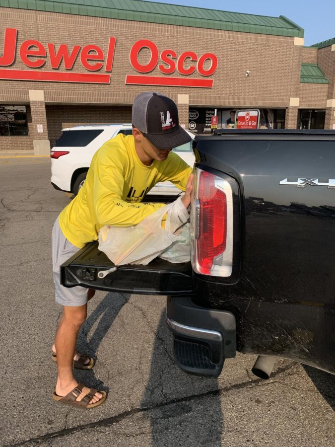 Helping someone load groceries into their car can be a simple act of kindness that goes a long way.