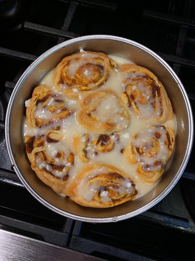 Staffer Reagan Brewer pictured a tin of freshly baked pumpkin cinnamon rolls. This pastry is a way start of the fall season with a sweet and warm pumpkin treat as the days get colder.
