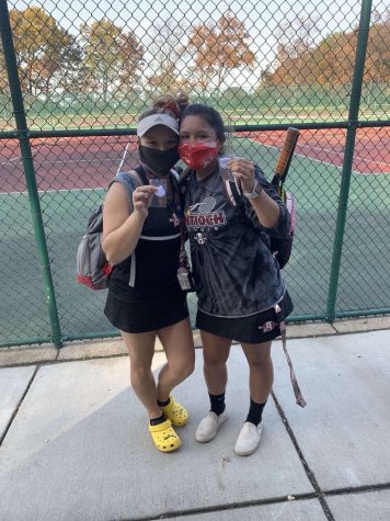 Jocelyn Cabuyadao and Natalie Labicki after their last match at sectionals. After they beat Grayslake Central, they placed 3rd.