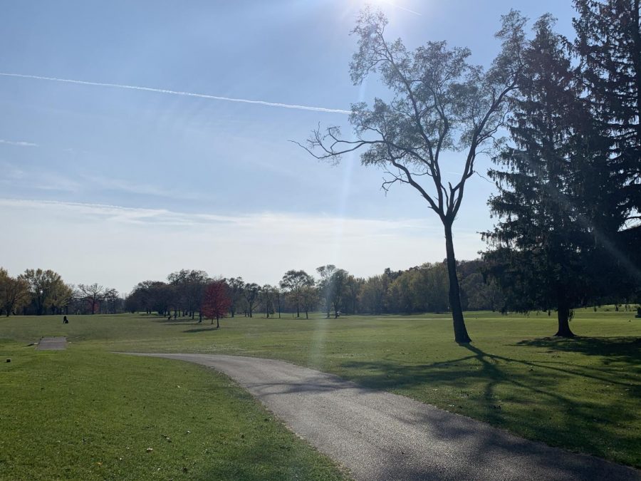 Hole 3 at Bristol Oaks Golf Club with slight overcast and some sun peeking through the clouds.