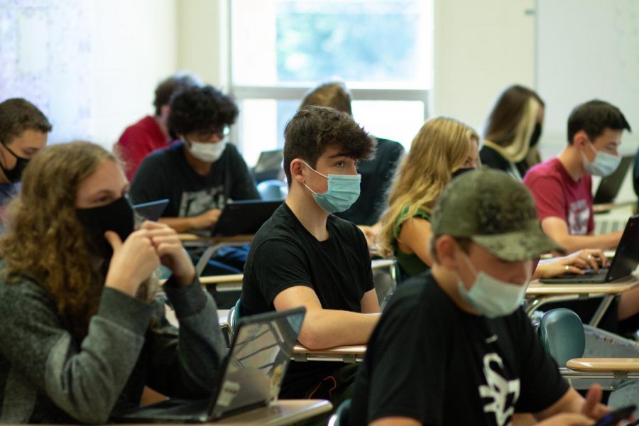 Ayden Burton sits in Ms. Ruleys psychology class.