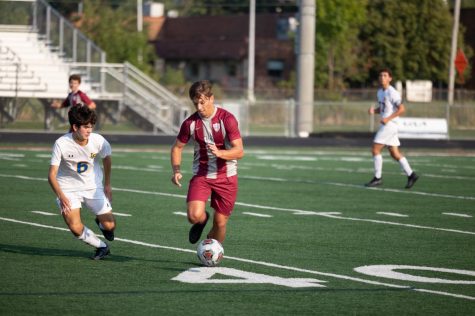 Senior Remi Ivanovas carries the ball down the field before assisting on the Sequoits only goal of the game.