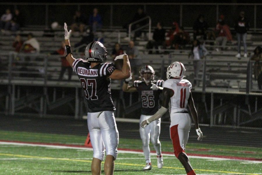 Joey+Neumann+celebrates+after+catching+a+touchdown+pass%2C+extending+the+Sequoits+lead.