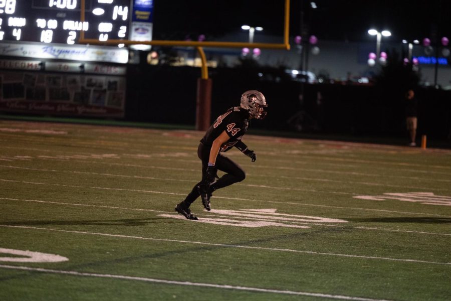 Senior Leo Reband defends along the 40 yard line.