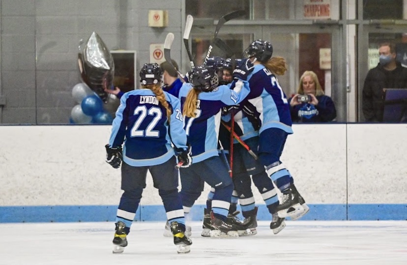 MJA girls hockey scores a goal.