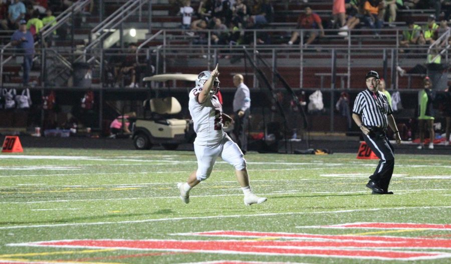 Sophomore Nick Day scoring a touchdown in the fourth quarter, extending the Sequoits lead.