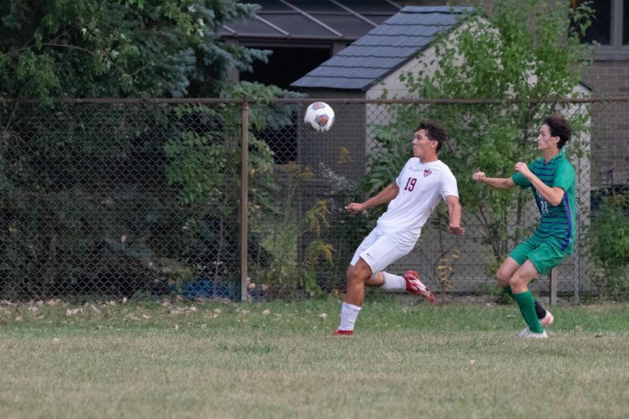 Alex Correa goes head to head with opposing team.