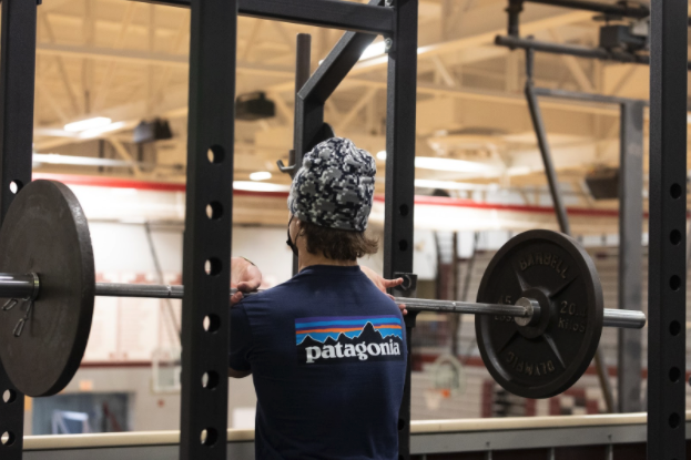 Junior Tj Schuyler lifts after school to prepare for the upcoming baseball season.