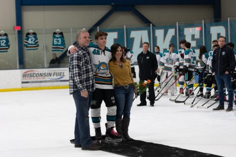 Senior Jason Fogel, as well as other seniors, got to spend time with their families on the ice on Saturday, Jan. 8. 
