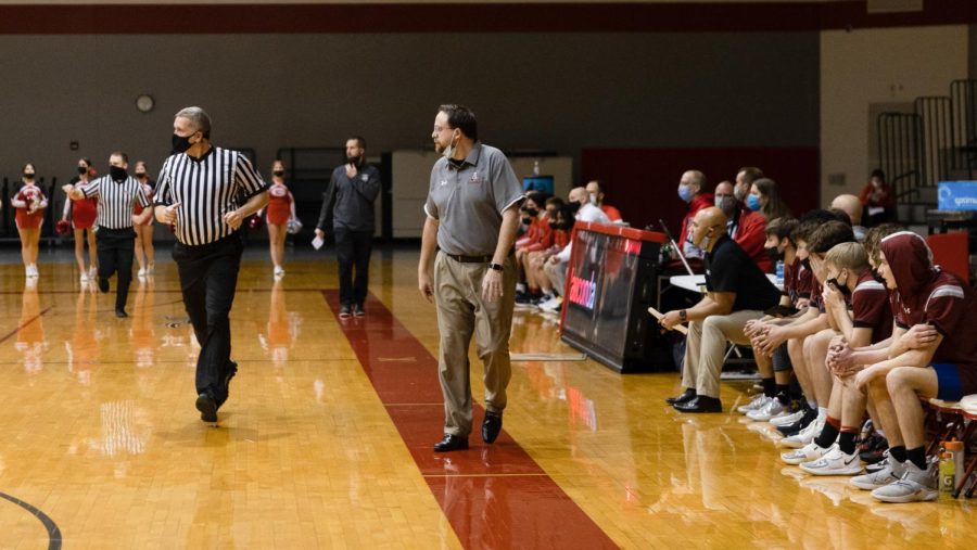 Coach Connor analyzes his players on the court. 