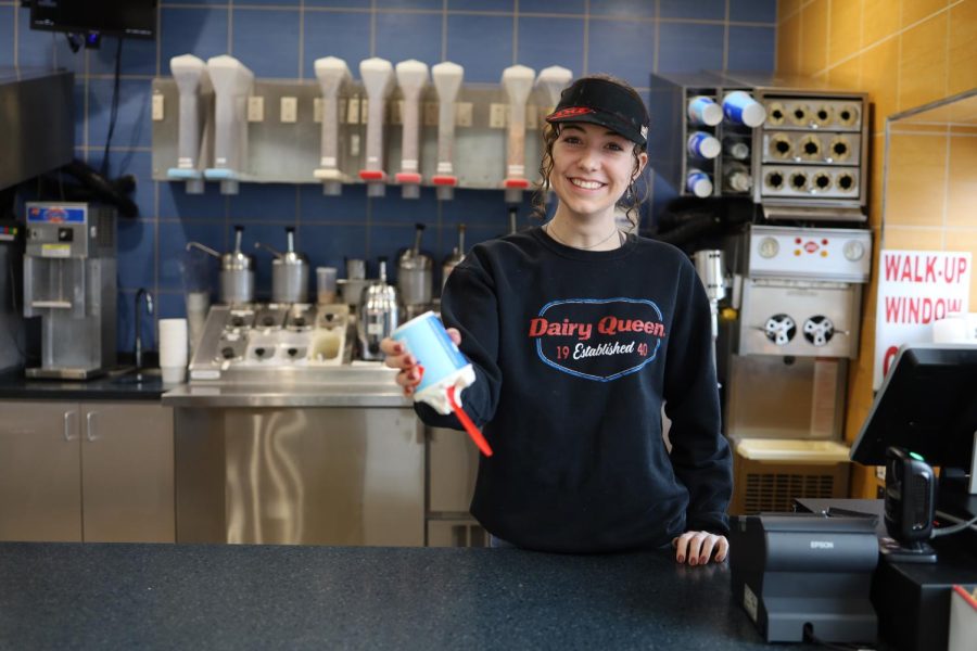 Dairy Queen worker and ACHS senior, Sidney Tindell, finishes making a blizzard with the famous upside down blizzard test.