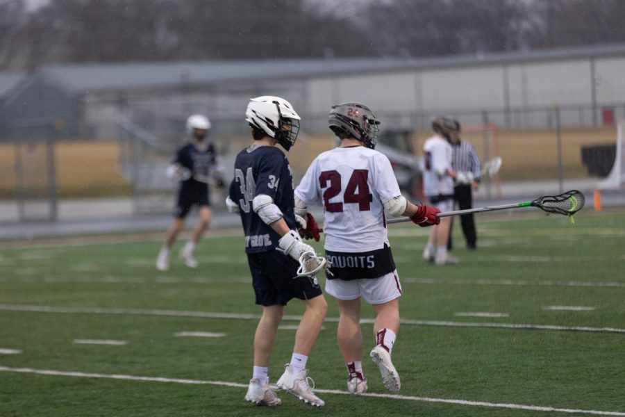 Sophomore Nick Day playing defense against Cary-Grove.