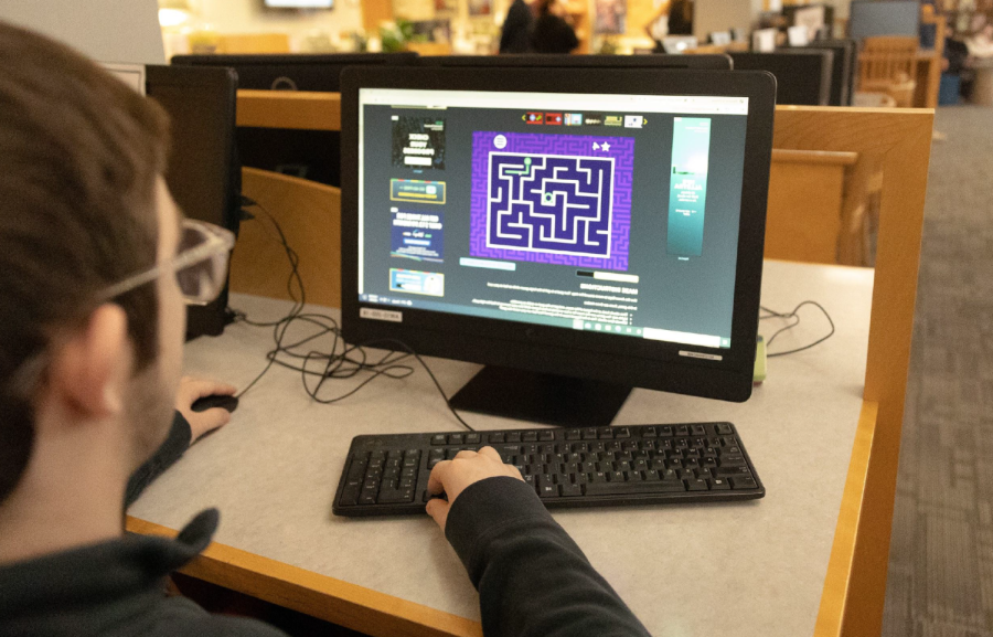The Gamers Club meets in room 206, but students often game in the library before school.