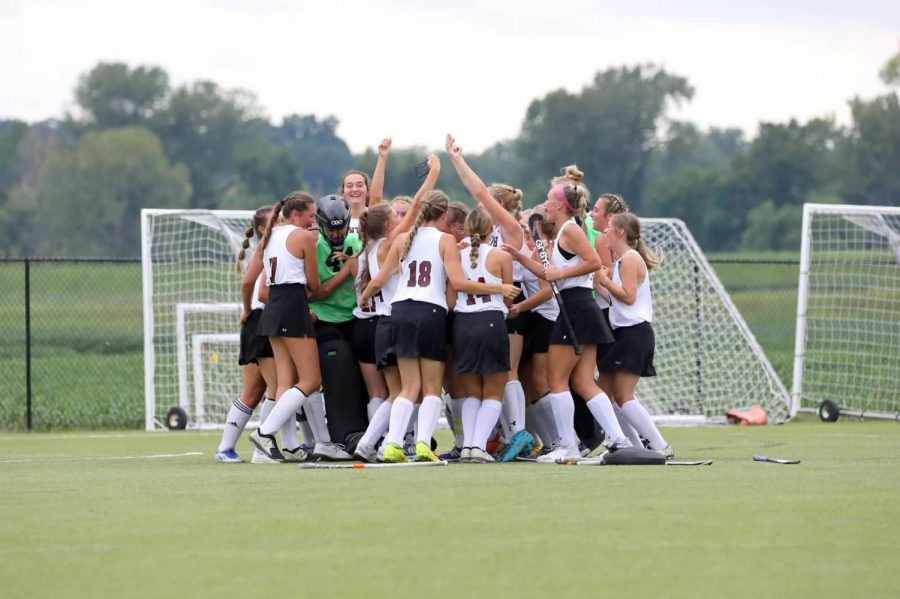 The field hockey team celebrating a win.