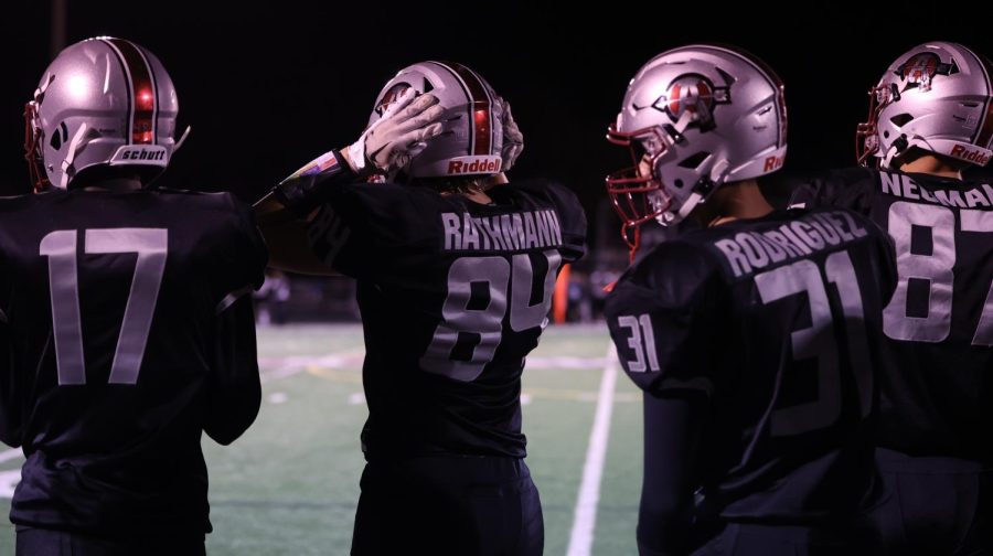 Sophomore Roddie Rathman watching play during game against Grayslake North