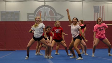 The Antioch Cheer team practicing their dance in the routine