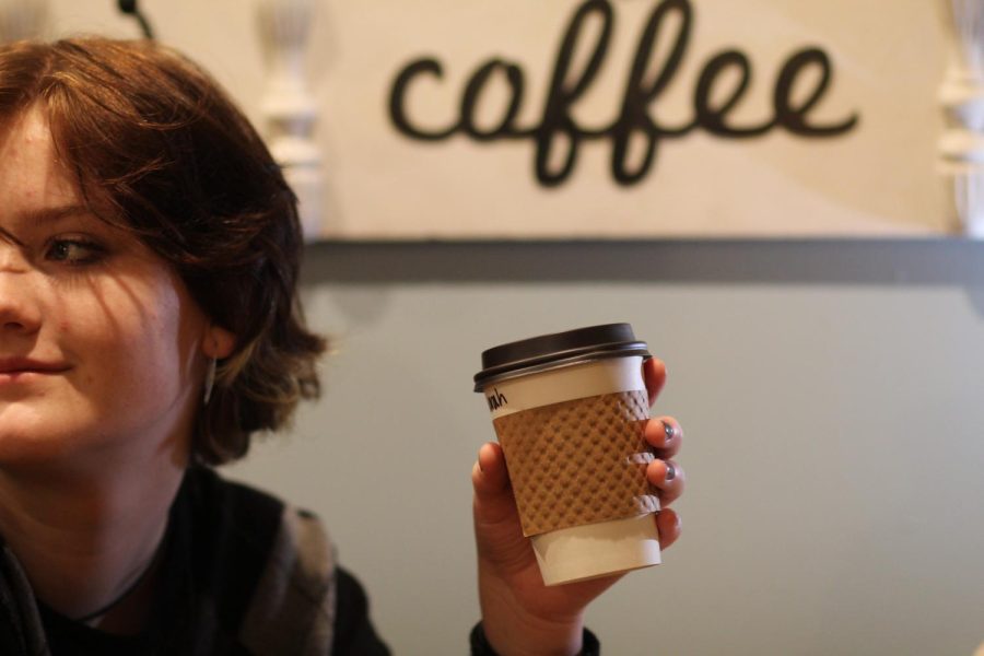 Annika Oksanen is pictured with a vanilla cappuccino from Little Bean Coffee company, picture taken by Nora Oksanen.