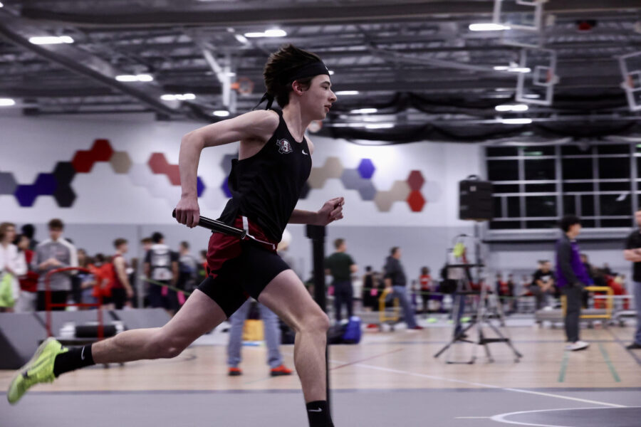 Junior Tyler Wolfe closing out the boys 4X800 relay. 