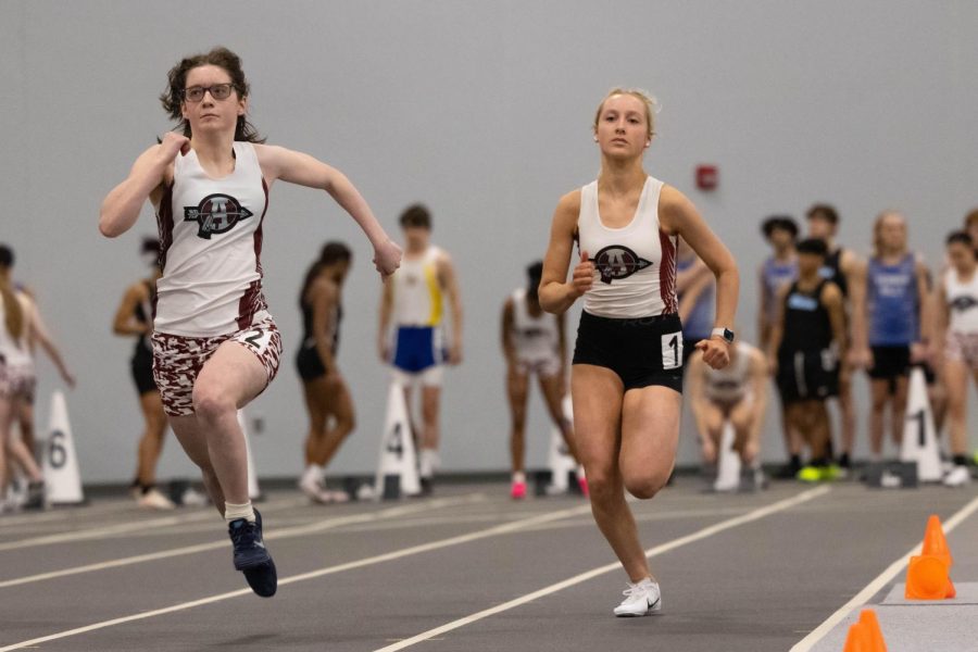 Sophomore+Kira+Larsen+and+freshman+Amerissa+Kaliakmanis+battled+it+out+in+the+60m+dash+during+the+indoor+quad+meet+on+Feb.+24%2C+2023.