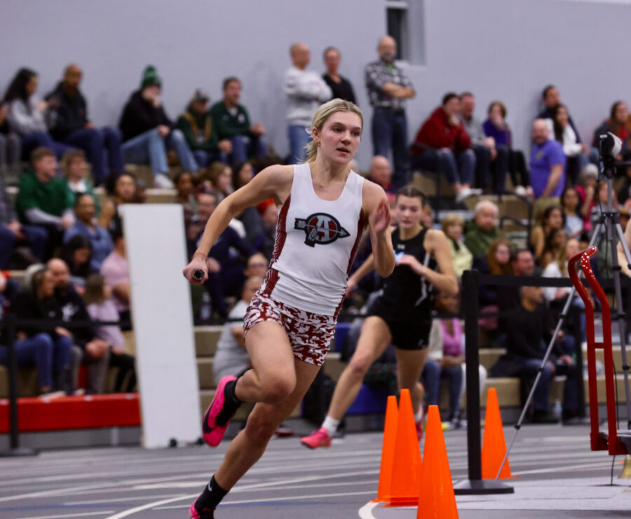 Senior Julia Kraus running her final 4x200 of the indoor season.