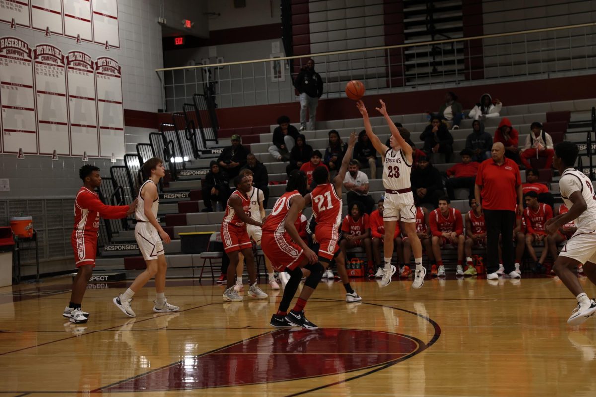 Carter Webb hitting a three pointer.