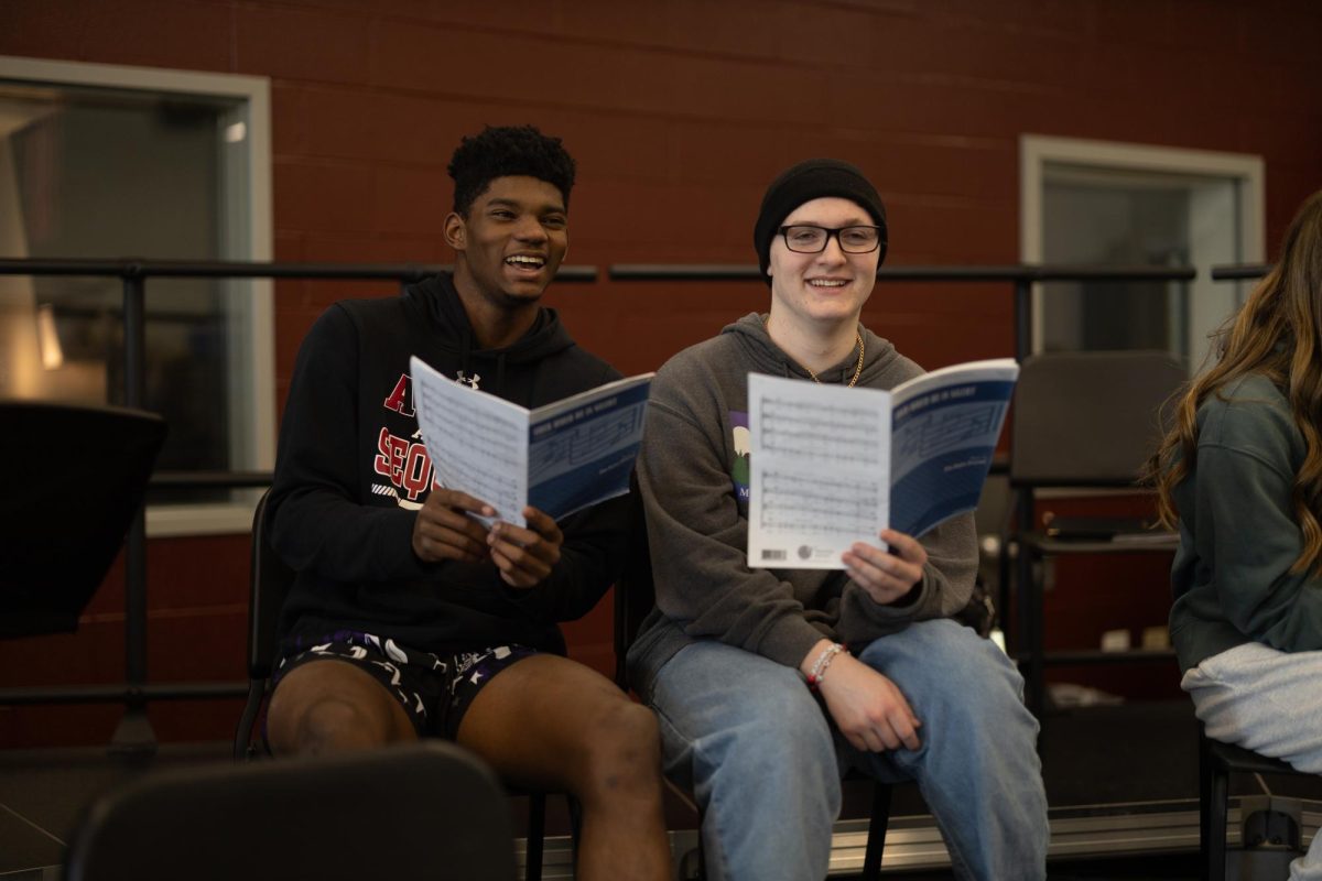 State qualifiers Marshall Gehrke and  Reddy Heilig practicing in choir class.