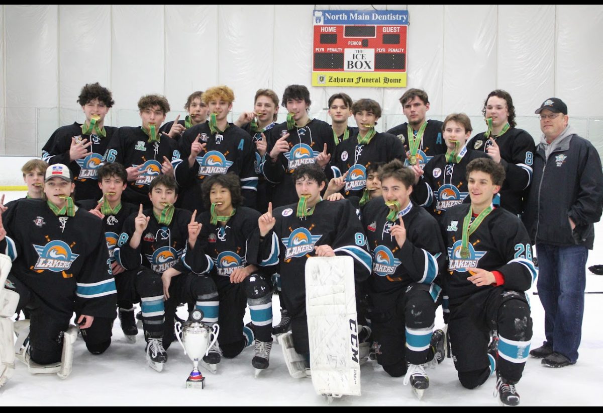 Lakers posing with the Irish cup after making it three years in a row the Lakers have won the Irish cup.